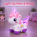 Unicorn toy with illuminated purple horn and wings